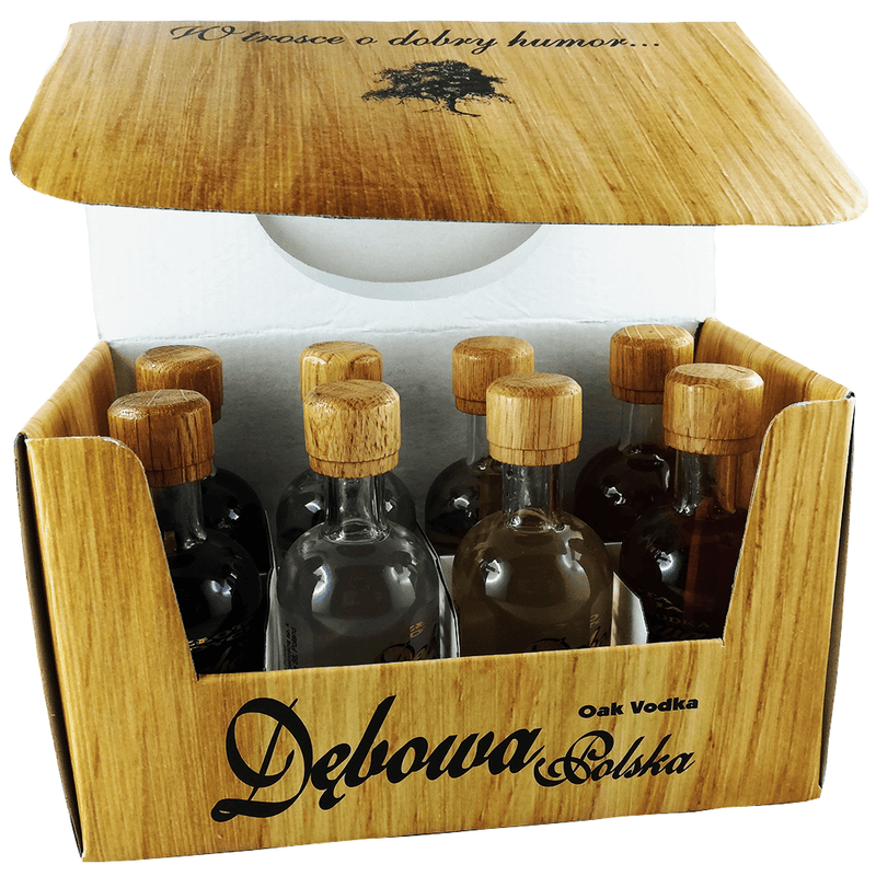 a wooden box filled with lots of different kinds of alcohol 